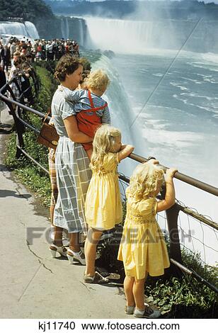 1950s mother and children looking at niagara falls new york View Large Photo Image Stock Image - 1950s mother and children looking at niagara falls new york. Fotosearch