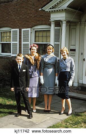 1950s mother with teenage girls & younger son dressed up posing in front of house View Large Photo Image Stock Image - 1950s mother with teenage girls & younger son dressed up posing in front of house. Fotosearch