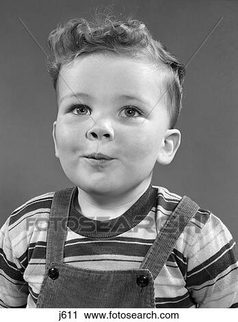 1950s portrait boy wearing stripe shirt corduroy overalls View Large Photo Image Stock Image - 1950s portrait boy wearing stripe shirt corduroy overalls. Fotosearch