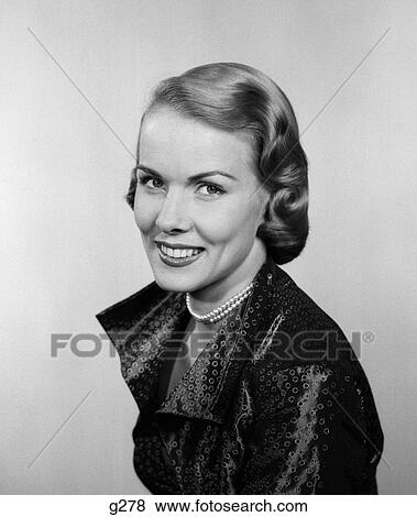 1950s smiling woman portrait wearing pearls View Large Photo Image Stock Photo - 1950s smiling woman portrait wearing pearls. Fotosearch