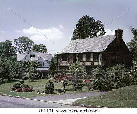 1950s street suburban community stone tudor style upscale house View Large Photo Image Stock Image - 1950s street suburban community stone tudor style upscale house. Fotosearch