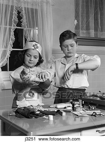 1950s two children playing pretending doctor nurse hospital View Large Photo Image Stock Image - 1950s two children playing pretending doctor nurse hospital. Fotosearch