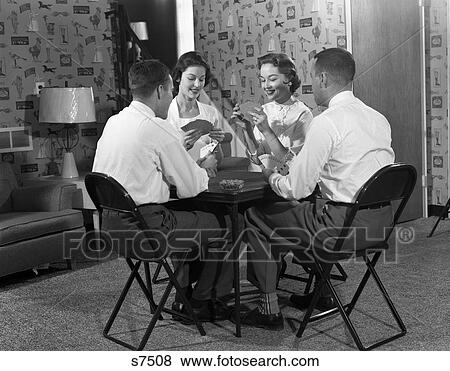 1950s two couples seated folding table playing cards View Large Photo Image Stock Photo - 1950s two couples seated folding table playing cards. Fotosearch