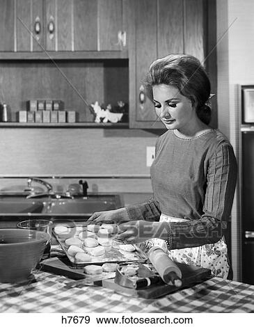 1950s woman baking kitchen rolling pin housewife View Large Photo Image Stock Photo - 1950s woman baking kitchen rolling pin housewife. Fotosearch