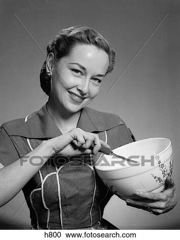 1950s woman mixing bowl baking cooking kitchen View Large Photo Image Stock Image - 1950s woman mixing bowl baking cooking kitchen. Fotosearch
