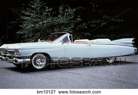 1959 white cadillac eldorado biarritz convertible automobile side view View Large Photo Image Stock Photo - 1959 white cadillac eldorado biarritz convertible automobile side view. Fotosearch