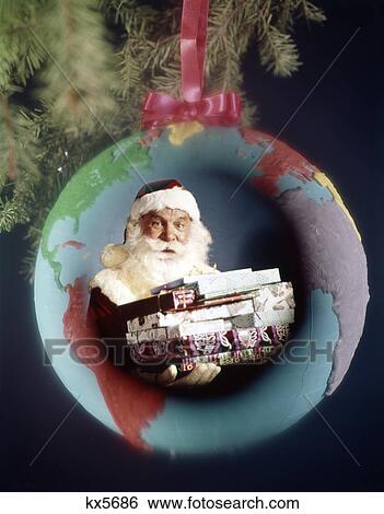 1960s 1970s composite image christmas decoration earth globe santa claus with presents View Large Photo Image Stock Photograph - 1960s 1970s composite image christmas decoration earth globe santa claus with presents. Fotosearch