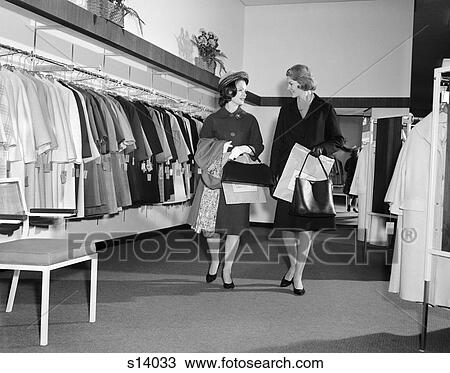 1960s 2 women shopping coats View Large Photo Image Stock Image - 1960s 2 women shopping coats. Fotosearch