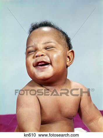 1960s african-american baby boy portrait laughing smiling happy face View Large Photo Image Stock Image - 1960s african-american baby boy portrait laughing smiling happy face. Fotosearch