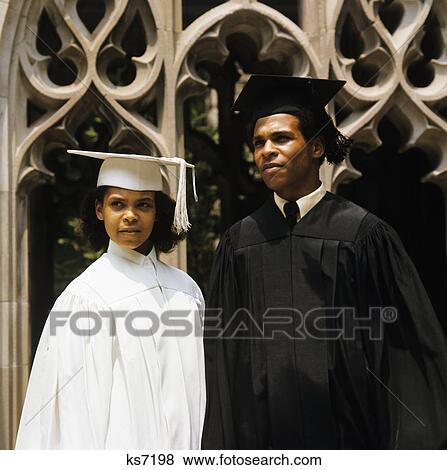 1960s african american teenage boy and girl wearing graduation robes View Large Photo Image Stock Photo - 1960s african american teenage boy and girl wearing graduation robes. Fotosearch