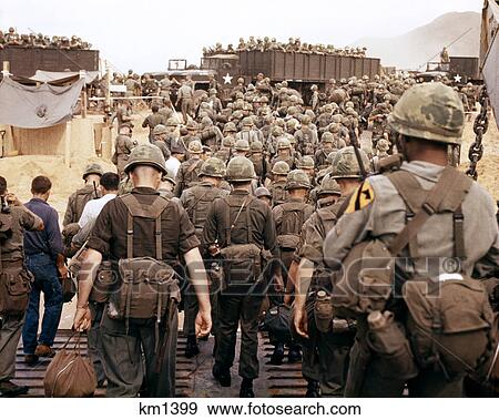 1960s arrival of us army soldiers in vietnam as they land on beach View Large Photo Image Stock Photo - 1960s arrival of us army soldiers in vietnam as they land on beach. Fotosearch