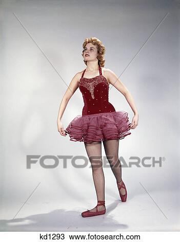 1960s awkward teen girl red velvet tutu pink net costume dance pose View Large Photo Image Stock Image - 1960s awkward teen girl red velvet tutu pink net costume dance pose. Fotosearch