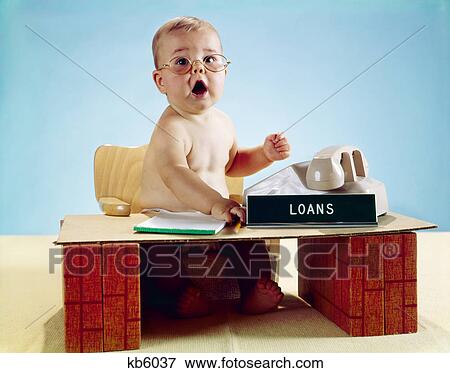 1960s baby businessman diaper sitting at toy desk loans bank sign wearing eyeglasses View Large Photo Image Stock Photo - 1960s baby businessman diaper sitting at toy desk loans bank sign wearing eyeglasses. Fotosearch