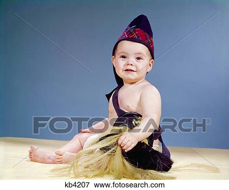 1960s baby dressed in scottish costume smiling View Large Photo Image Stock Photo - 1960s baby dressed in scottish costume smiling. Fotosearch