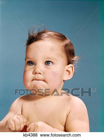 1960s baby portrait serious facial expression View Large Photo Image Stock Photo - 1960s baby portrait serious facial expression. Fotosearch