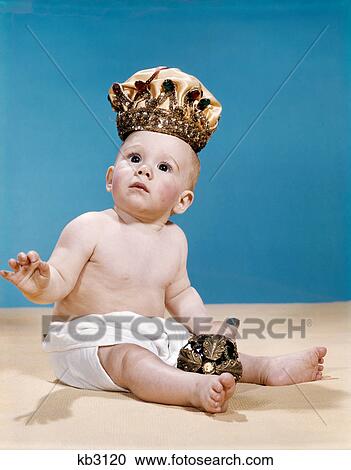 1960s baby wearing cloth diaper and crown of king holding a royal monarchs scepter View Large Photo Image Stock Image - 1960s baby wearing cloth diaper and crown of king holding a royal monarchs scepter. Fotosearch