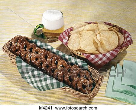 1960s beer mug baskets chips pretzels View Large Photo Image Stock Image - 1960s beer mug baskets chips pretzels. Fotosearch