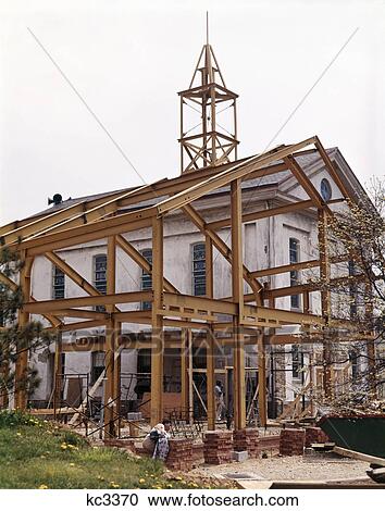Stock Image - 1960s church addition under construction. Fotosearch