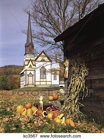 1960s church in autumn gourds pumpkins baskets of apples dried corn east orange vt new england scenic View Large Photo Image Stock Photo - 1960s church in autumn gourds pumpkins baskets of apples dried corn east orange vt new england scenic. Fotosearch