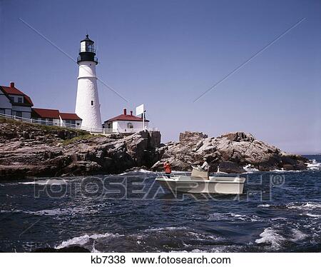 1960s couple in power boat by portland head lighthouse View Large Photo Image Stock Photo - 1960s couple in power boat by portland head lighthouse. Fotosearch