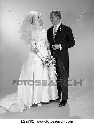 Stock Image - 1960s couple wedding portrait. Fotosearch