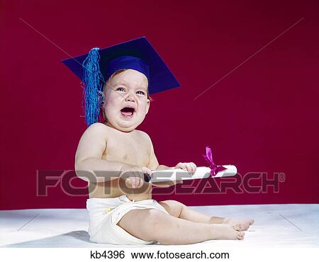 Stock Photograph - 1960s crying baby holding diploma wearing graduation cap mortarboard. Fotosearch