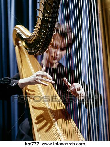 1960s harp musician woman strings View Large Photo Image Stock Photo - 1960s harp musician woman strings. Fotosearch