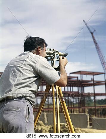 1960s man using surveying equipment sighting surveyor transit theodolite engineer construction site View Large Photo Image Stock Photography - 1960s man using surveying equipment sighting surveyor transit theodolite engineer construction site. Fotosearch
