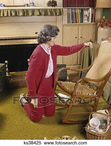 1960s middle aged woman repairing caned chair seat View Large Photo Image Stock Photography - 1960s middle aged woman repairing caned chair seat. Fotosearch