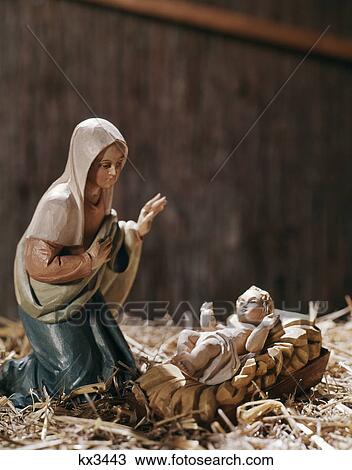 1960s nativity scene mary looking at baby jesus in manger View Large Photo Image Stock Image - 1960s nativity scene mary looking at baby jesus in manger. Fotosearch