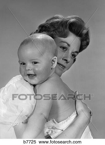 1960s pensive mother and happy child View Large Photo Image Stock Photography - 1960s pensive mother and happy child. Fotosearch