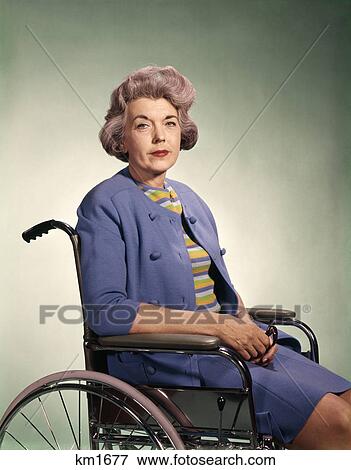 1960s portrait of senior woman sitting in wheelchair View Large Photo Image Stock Photo - 1960s portrait of senior woman sitting in wheelchair. Fotosearch