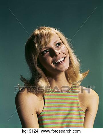 1960s portrait of young blond woman smiling wearing striped sleeveless top View Large Photo Image Picture - 1960s portrait of young blond woman smiling wearing striped sleeveless top. Fotosearch