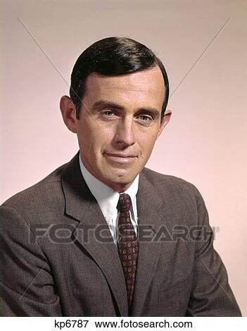 1960s portrait smiling businessman wearing business suit tie View Large Photo Image Stock Photo - 1960s portrait smiling businessman wearing business suit tie. Fotosearch