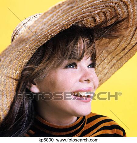 1960s portrait young brunette woman teen wearing straw hat smiling fashion View Large Photo Image Stock Image - 1960s portrait young brunette woman teen wearing straw hat smiling fashion. Fotosearch
