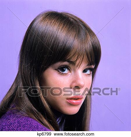 1960s portrait young brunette woman teen head shoulders purple background View Large Photo Image Stock Photo - 1960s portrait young brunette woman teen head shoulders purple background. Fotosearch
