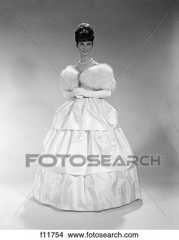 1960s pretty young woman wearing tiara fur stole and string of pearls View Large Photo Image Picture - 1960s pretty young woman wearing tiara fur stole and string of pearls. Fotosearch
