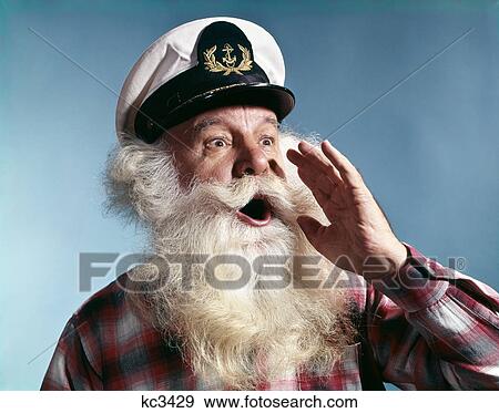 1960s senior man full white beard wear ship captains hat shouting with hand cupped to mouth View Large Photo Image Stock Photo - 1960s senior man full white beard wear ship captains hat shouting with hand cupped to mouth. Fotosearch