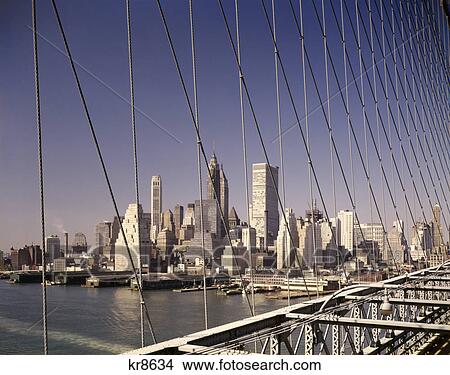 Picture - 1960s skyline downtown manhattan from brooklyn bridge. Fotosearch