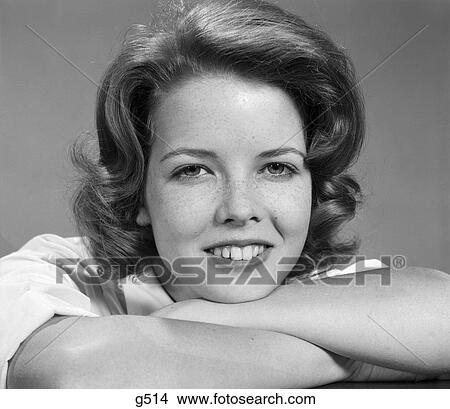 1960s smiling teen girl portrait arms folded View Large Photo Image Picture - 1960s smiling teen girl portrait arms folded. Fotosearch