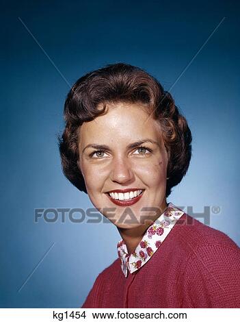 1960s smiling woman looking directly ahead studio View Large Photo Image Picture - 1960s smiling woman looking directly ahead studio. Fotosearch