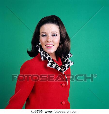 1960s smiling young woman brunette red coat leopard skin fur collar View Large Photo Image Stock Photography - 1960s smiling young woman brunette red coat leopard skin fur collar. Fotosearch
