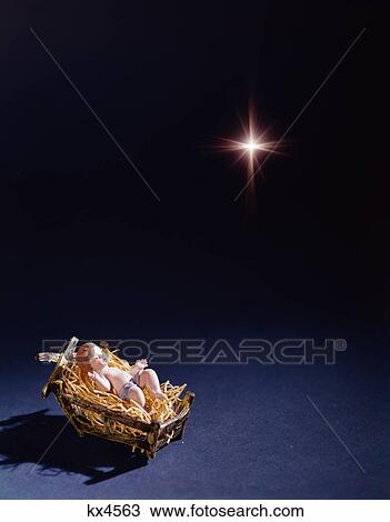1960s star of bethlehem above baby jesus lying in manger View Large Photo Image Stock Image - 1960s star of bethlehem above baby jesus lying in manger. Fotosearch