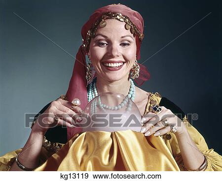 1960s woman portrait character crystal ball fortune teller costume View Large Photo Image Stock Photo - 1960s woman portrait character crystal ball fortune teller costume. Fotosearch