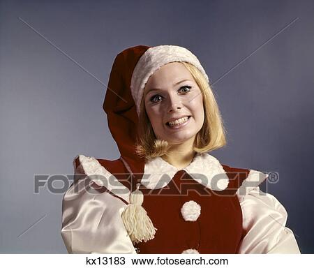 1960s woman wearing christmas santa helper costume View Large Photo Image Stock Image - 1960s woman wearing christmas santa helper costume. Fotosearch