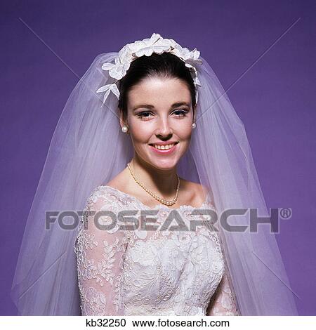 1960s young woman bride portrait bridal veil head shoulders smiling pearls View Large Photo Image Stock Image - 1960s young woman bride portrait bridal veil head shoulders smiling pearls. Fotosearch