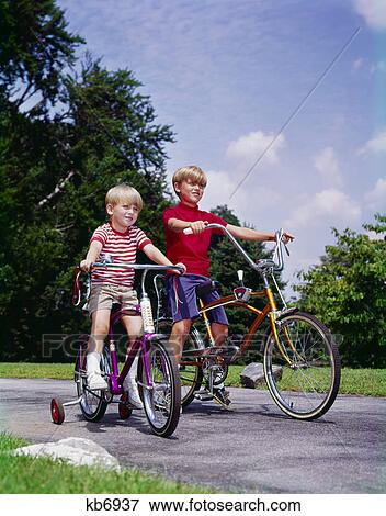 boys riding bikes