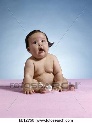 1970s chubby fat plump baby wearing diaper sitting on pink rug open mouth View Large Photo Image Stock Image - 1970s chubby fat plump baby wearing diaper sitting on pink rug open mouth. Fotosearch