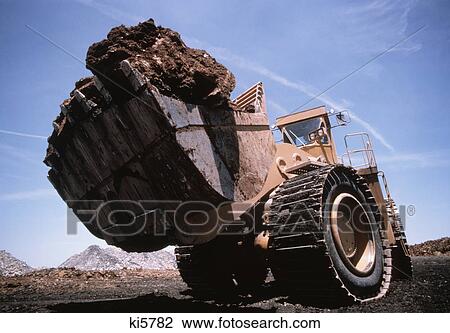 1970s coal mining truck moving dirt View Large Photo Image Stock Image - 1970s coal mining truck moving dirt. Fotosearch