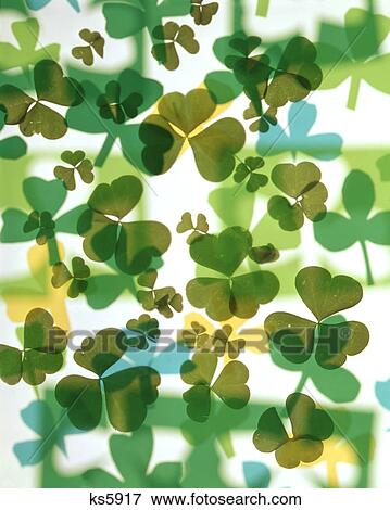 Stock Photo - 1970s colorful background montage overlapping shamrocks. Fotosearch